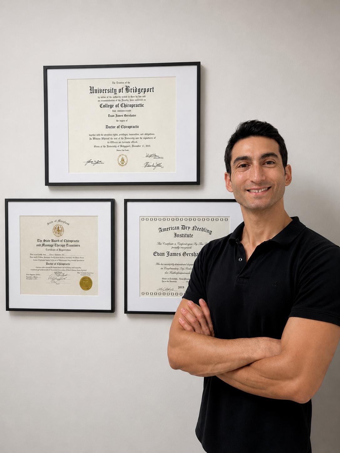 Dr. Evan Gershater DC with his chiropractic degree from the University of Bridgeport, Maryland State Board certification, and American Dry Needling Institute certification